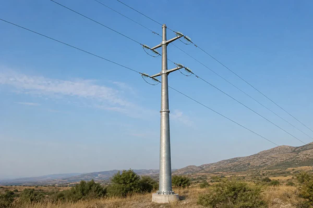 15m 10kV Round Tubular Distribution Flanged Pole - Dual-Circuit Steel Monopole deployed in an international application environment